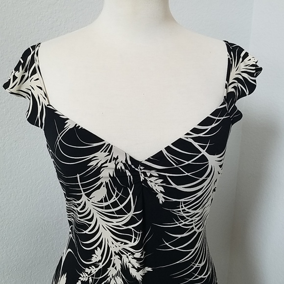 BCBGMaxAzria Dresses & Skirts - BCBG Black and White Asymmetrical Dress Medium